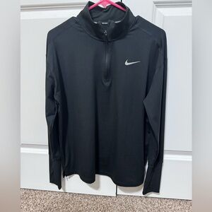 Nike Dri-fit pull over with half zip. Has thumb holes also. Only worn once.